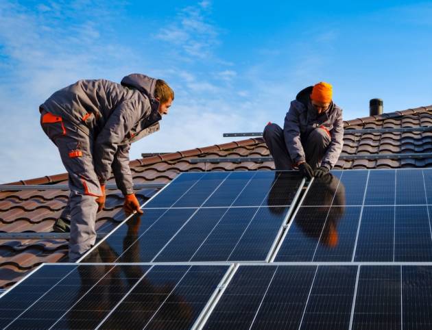 Installing,A,Solar,Cell,On,A,Roof.,Solar,Panels,On